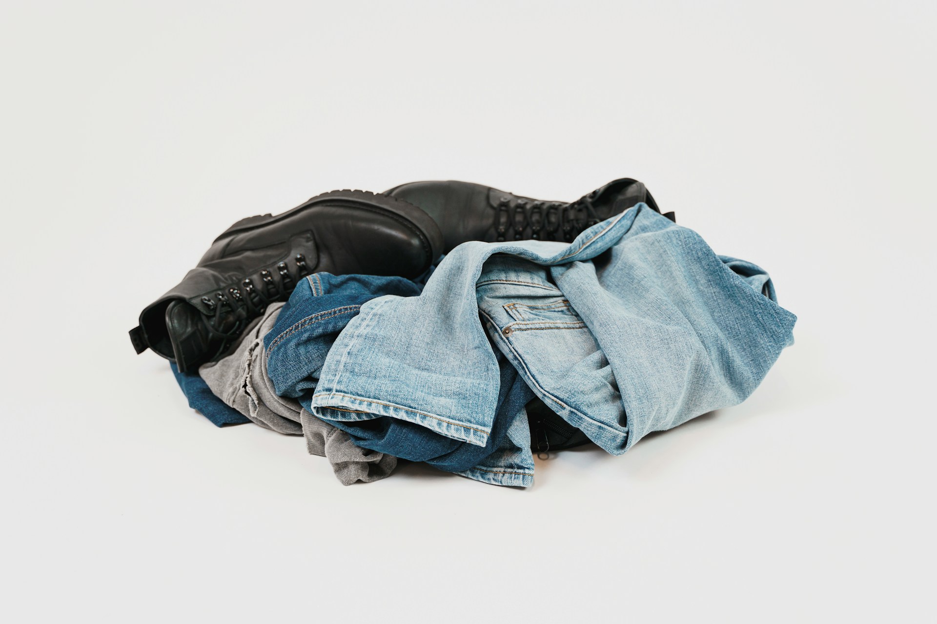pile of old clothes and shoes